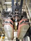 Used E-Pak Automatic Inline Quill Capper with Integrated Cap Elevator/Sorter.